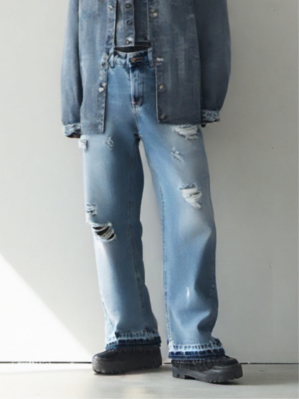 Jeans flare rotture uomo