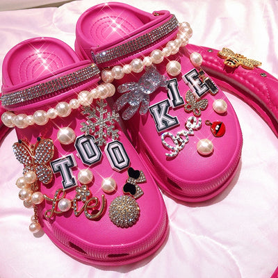 Ciabatta slipper in gomma con charm tipo crocs donna MUST HAVE